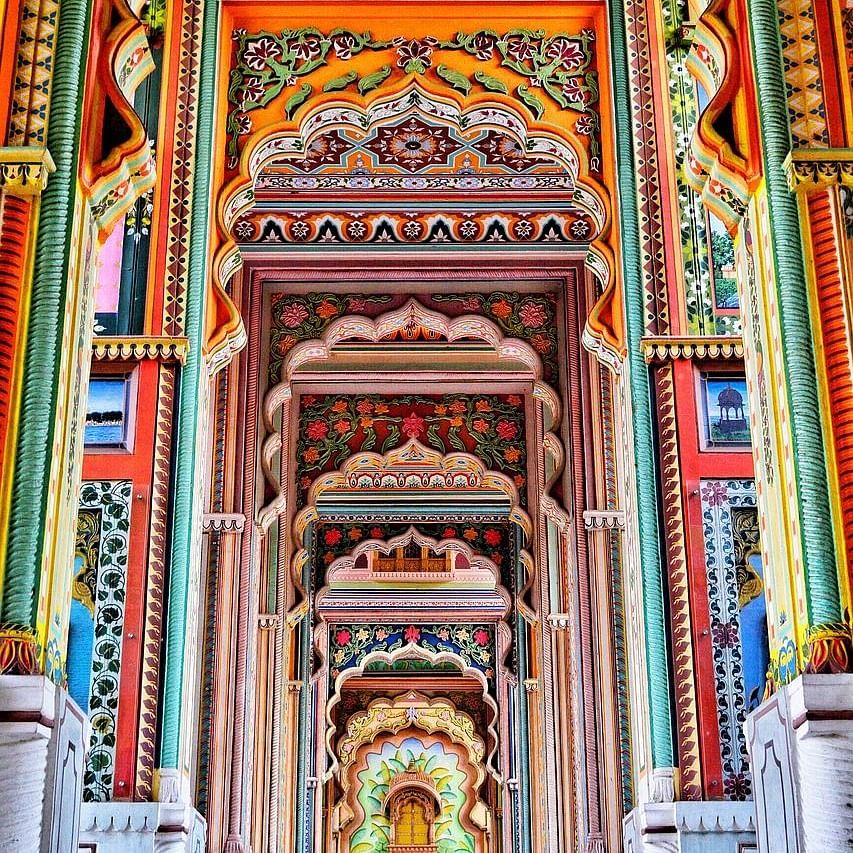 Archways showcasing intricate designs and vibrant hues in a majestic architectural setting.